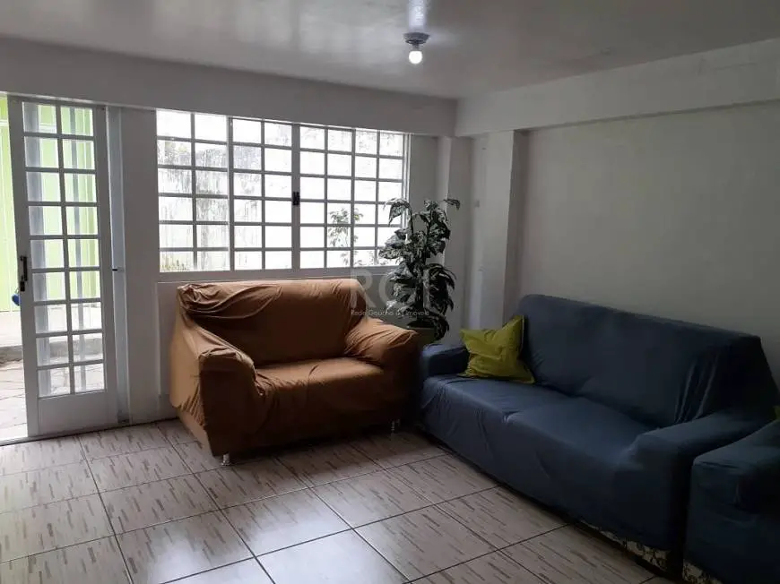 Foto 1 de Casa com 4 Quartos à venda, 234m² em Teresópolis, Porto Alegre
