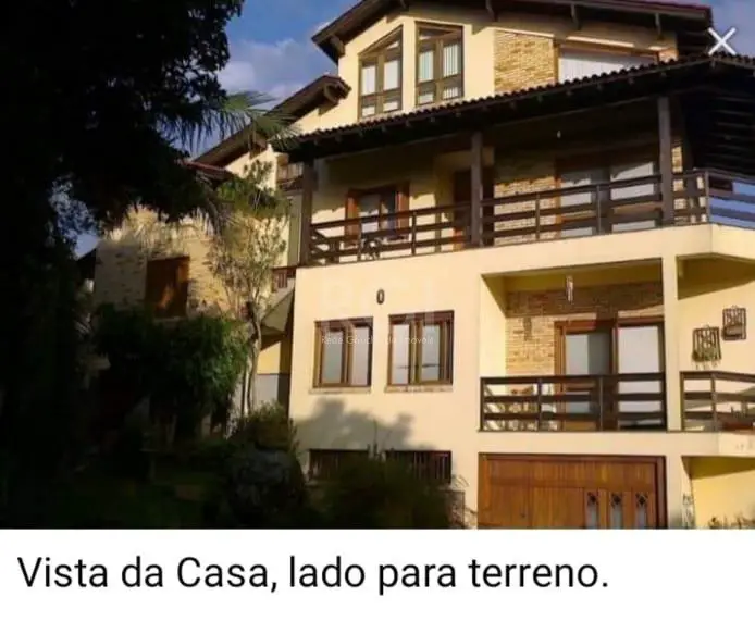 Foto 1 de Casa com 5 Quartos à venda, 410m² em Teresópolis, Porto Alegre