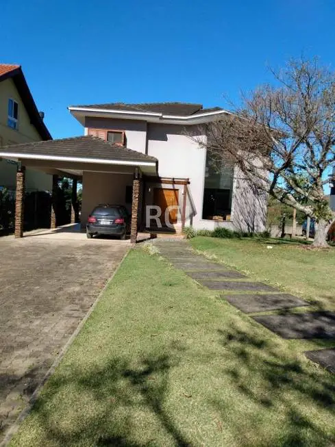 Foto 1 de Casa com 3 Quartos à venda, 254m² em Campo Novo, Porto Alegre