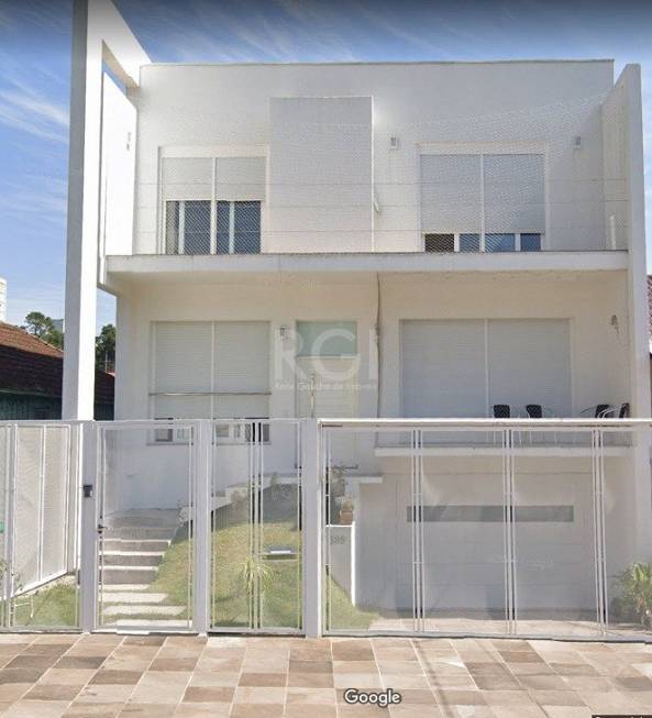 Foto 1 de Casa com 4 Quartos à venda, 562m² em Santo Antônio, Porto Alegre