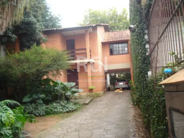 Foto 1 de Casa com 4 Quartos à venda, 280m² em Jardim Botânico, Porto Alegre