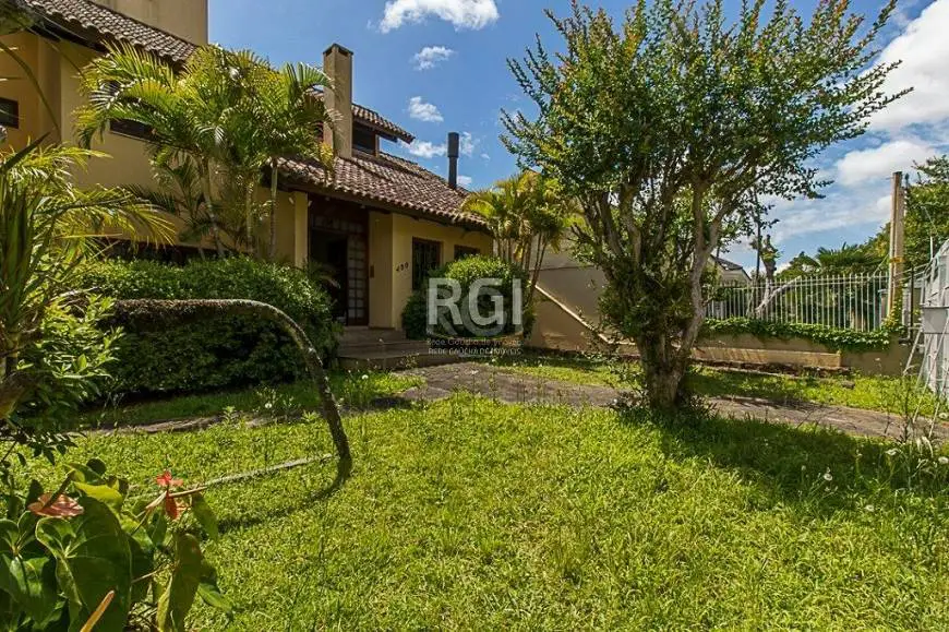 Foto 3 de Casa com 5 Quartos para alugar, 384m² em Três Figueiras, Porto Alegre
