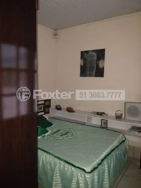 Foto 4 de Casa com 3 Quartos à venda, 130m² em Santa Fé, Porto Alegre