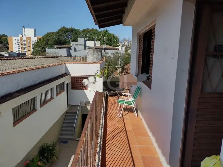 Foto 5 de Casa com 4 Quartos à venda, 181m² em Rio Branco, Porto Alegre