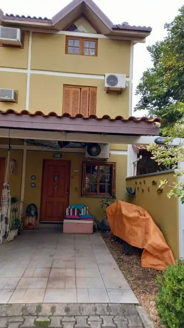 Foto 1 de Casa de Condomínio com 3 Quartos à venda, 100m² em Cristal, Porto Alegre