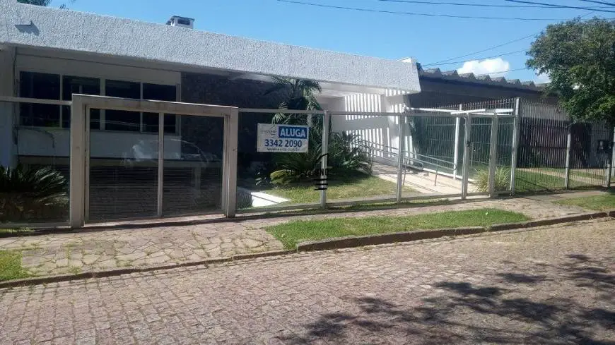 Foto 1 de Casa com 3 Quartos para alugar, 400m² em Três Figueiras, Porto Alegre