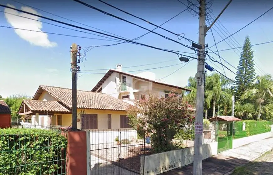 Foto 1 de Casa com 4 Quartos à venda, 86m² em Ipanema, Porto Alegre