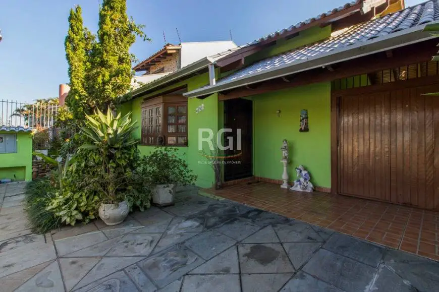 Foto 1 de Casa com 4 Quartos à venda, 150m² em Rubem Berta, Porto Alegre
