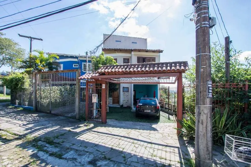 Foto 2 de Casa com 3 Quartos à venda, 144m² em Ipanema, Porto Alegre