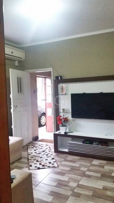 Foto 1 de Apartamento com 2 Quartos à venda, 49m² em Navegantes, Porto Alegre