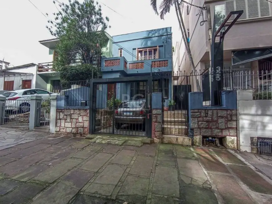 Foto 1 de Casa com 3 Quartos à venda, 88m² em Auxiliadora, Porto Alegre