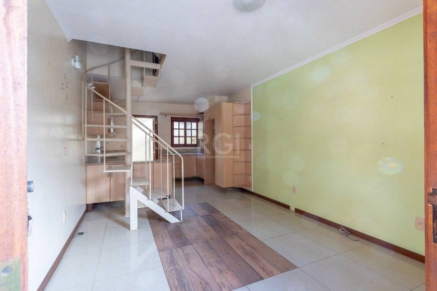 Foto 2 de Casa com 3 Quartos à venda, 100m² em Camaquã, Porto Alegre