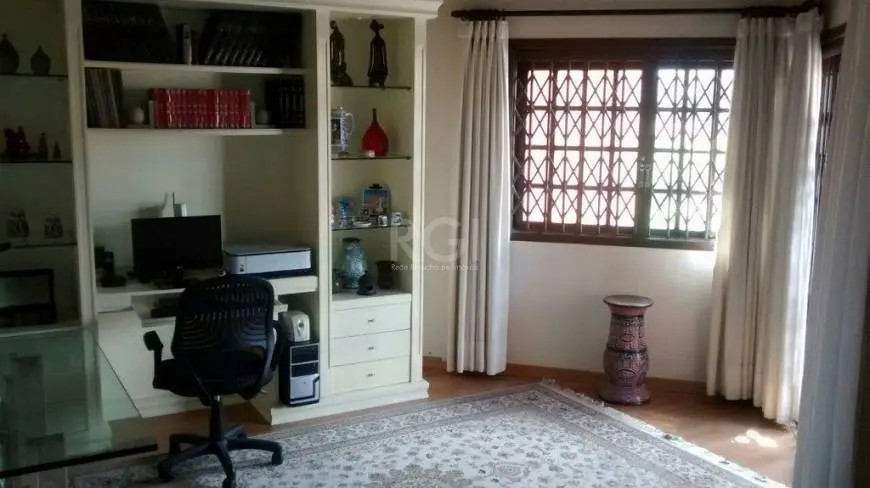 Foto 1 de Casa com 3 Quartos à venda, 316m² em Cavalhada, Porto Alegre