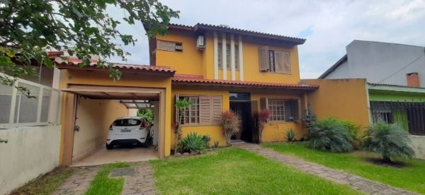Foto 2 de Casa com 3 Quartos à venda, 226m² em Guarujá, Porto Alegre