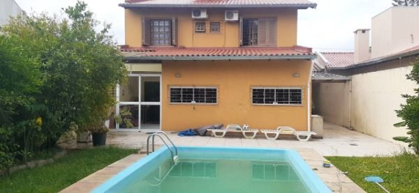 Foto 4 de Casa com 3 Quartos à venda, 226m² em Guarujá, Porto Alegre