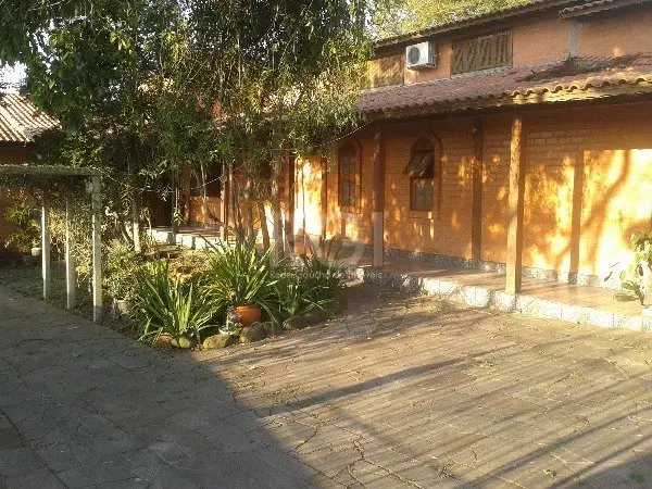 Foto 1 de Casa com 3 Quartos à venda, 447m² em Jardim Floresta, Porto Alegre