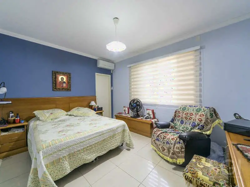 Foto 5 de Casa com 3 Quartos à venda, 292m² em Rio Branco, Porto Alegre