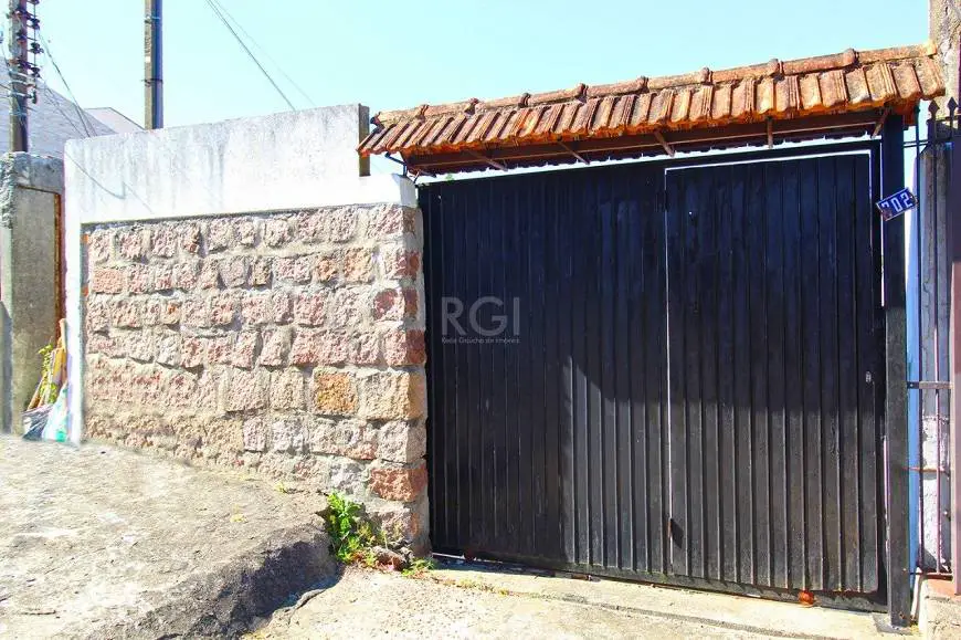 Foto 1 de Casa com 3 Quartos à venda, 150m² em Santo Antônio, Porto Alegre