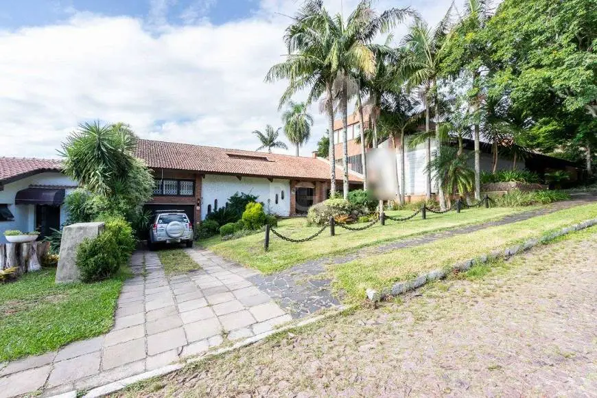 Foto 1 de Casa com 3 Quartos à venda, 365m² em Vila Assunção, Porto Alegre