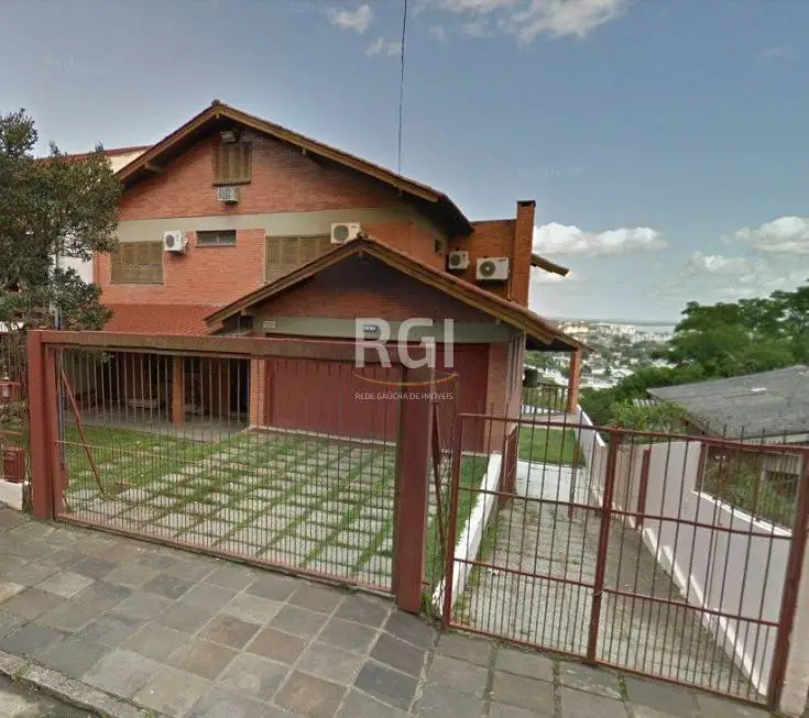 Foto 2 de Casa com 3 Quartos à venda, 430m² em Vila Nova, Porto Alegre