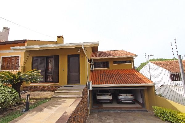 Foto 1 de Casa com 4 Quartos à venda, 287m² em Aberta dos Morros, Porto Alegre