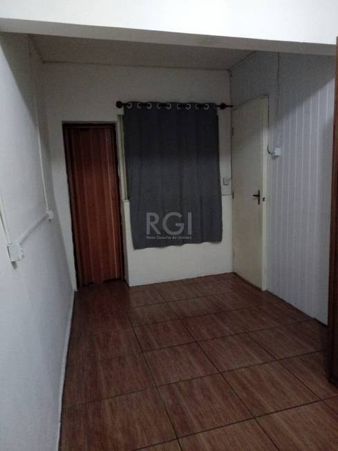 Foto 2 de Casa com 4 Quartos à venda, 136m² em Agronomia, Porto Alegre