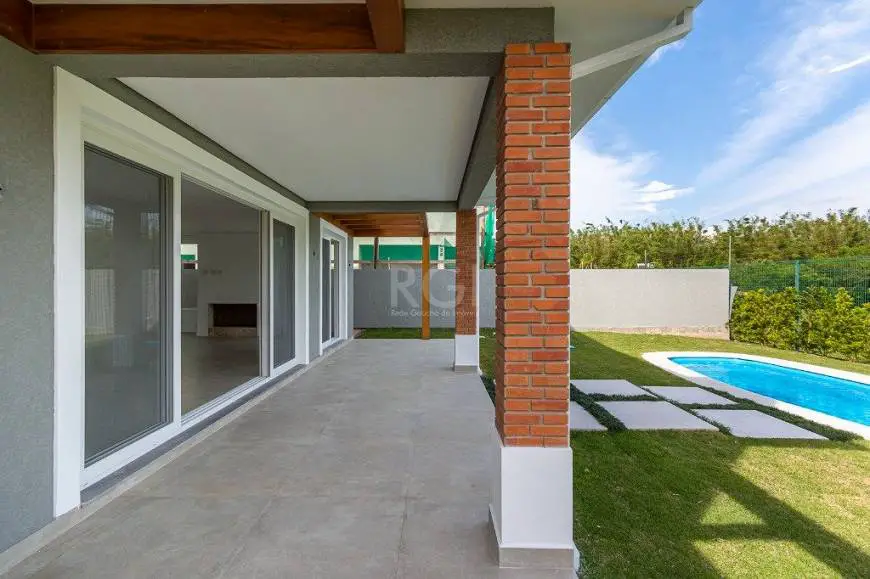 Foto 2 de Casa com 4 Quartos à venda, 285m² em Alphaville, Porto Alegre