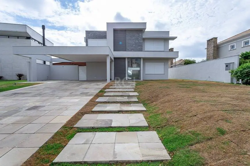 Foto 1 de Casa com 4 Quartos à venda, 281m² em Belém Novo, Porto Alegre