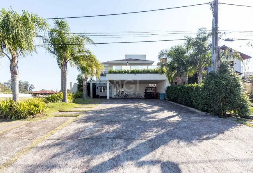 Foto 1 de Casa com 4 Quartos à venda, 384m² em Belém Novo, Porto Alegre