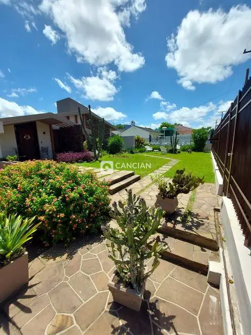 Foto 2 de Casa com 4 Quartos para venda ou aluguel, 496m² em Camobi, Santa Maria