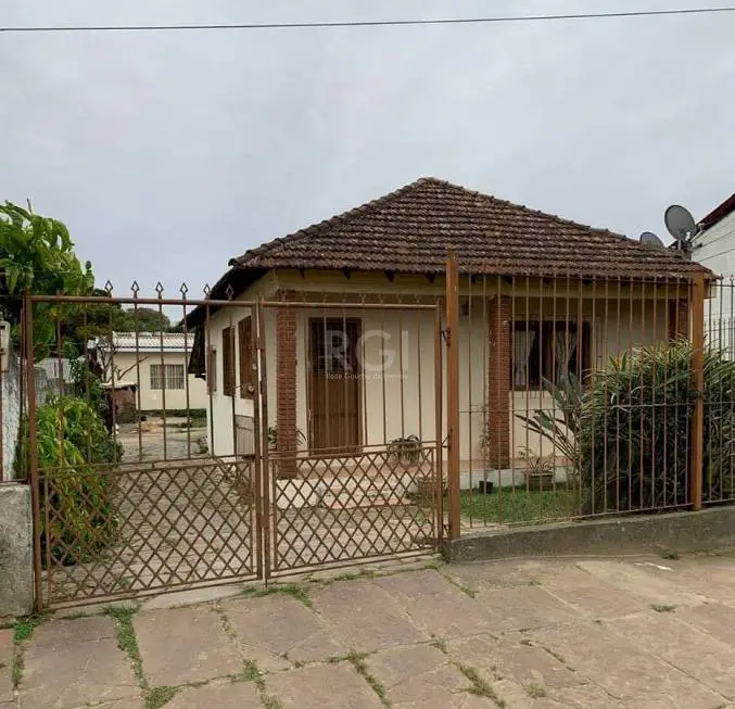 Foto 2 de Casa com 4 Quartos à venda, 146m² em Cavalhada, Porto Alegre