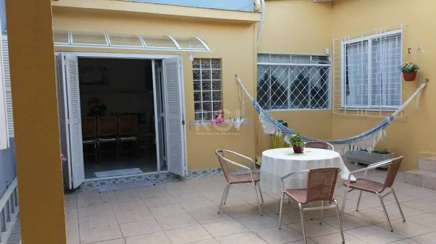 Foto 1 de Casa com 4 Quartos à venda, 289m² em Cavalhada, Porto Alegre