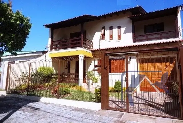 Foto 1 de Casa com 4 Quartos à venda, 318m² em Cavalhada, Porto Alegre