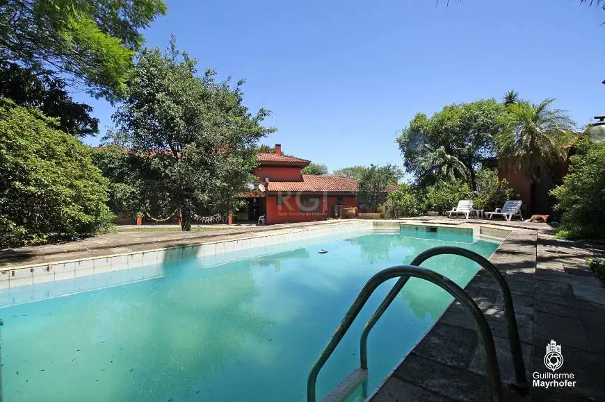 Foto 1 de Casa com 4 Quartos à venda, 486m² em Cavalhada, Porto Alegre