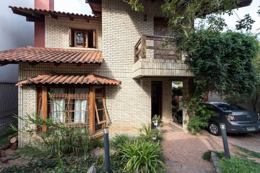 Foto 1 de Casa com 4 Quartos à venda, 295m² em Ipanema, Porto Alegre