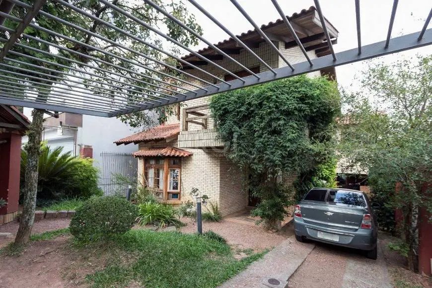 Foto 3 de Casa com 4 Quartos à venda, 295m² em Ipanema, Porto Alegre