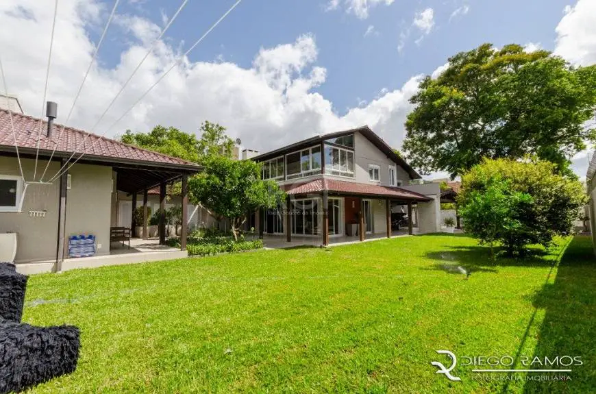 Foto 1 de Casa com 4 Quartos à venda, 351m² em Ipanema, Porto Alegre