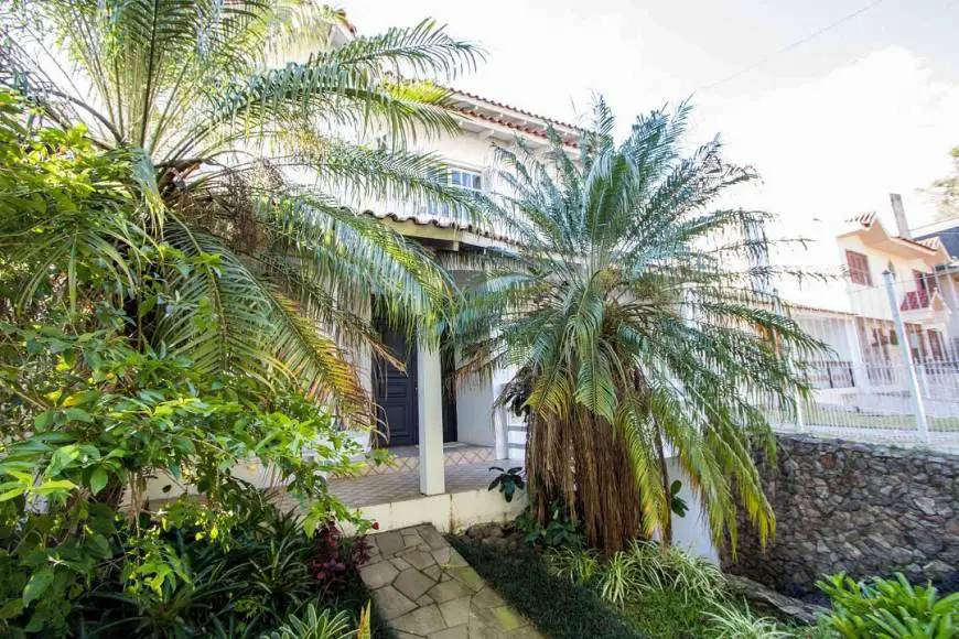 Foto 2 de Casa com 4 Quartos à venda, 383m² em Ipanema, Porto Alegre