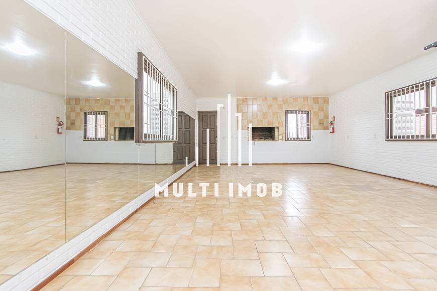 Foto 3 de Casa com 4 Quartos para venda ou aluguel, 640m² em Jardim do Salso, Porto Alegre