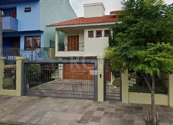 Foto 2 de Casa com 4 Quartos à venda, 310m² em Jardim Itú Sabará, Porto Alegre