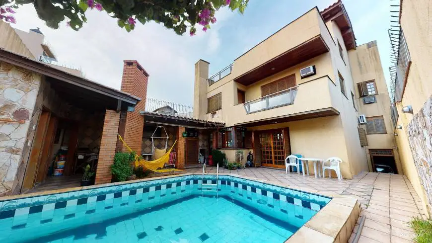 Foto 1 de Casa com 4 Quartos à venda, 420m² em Partenon, Porto Alegre