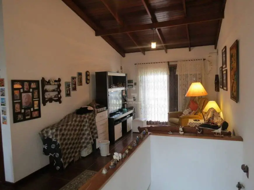 Foto 5 de Casa com 4 Quartos à venda, 136m² em Rio Branco, Porto Alegre
