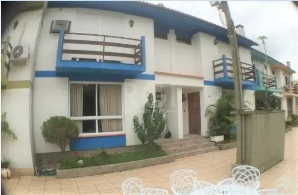 Foto 1 de Casa com 4 Quartos à venda, 156m² em Santo Antônio, Porto Alegre