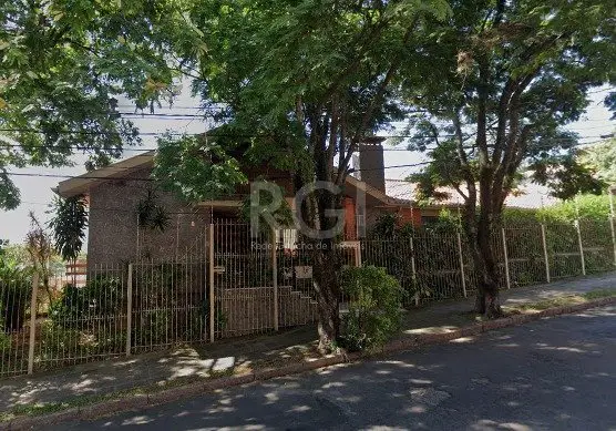 Foto 1 de Casa com 4 Quartos à venda, 306m² em Santo Antônio, Porto Alegre