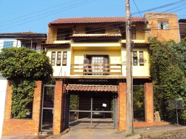 Foto 1 de Casa com 4 Quartos à venda, 357m² em Santo Antônio, Porto Alegre