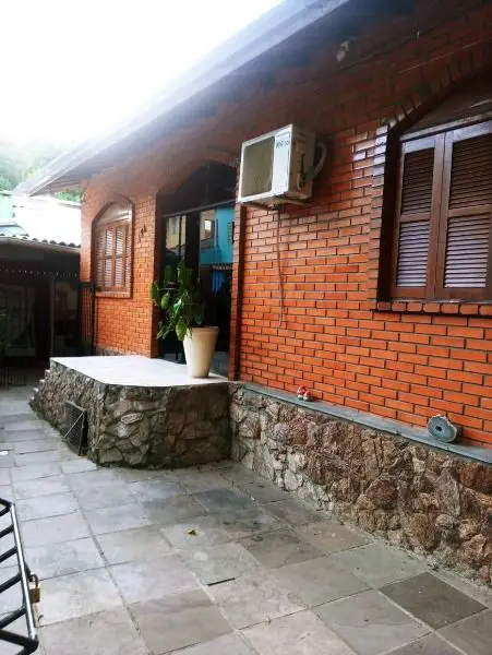 Foto 1 de Casa com 4 Quartos à venda, 110m² em Teresópolis, Porto Alegre