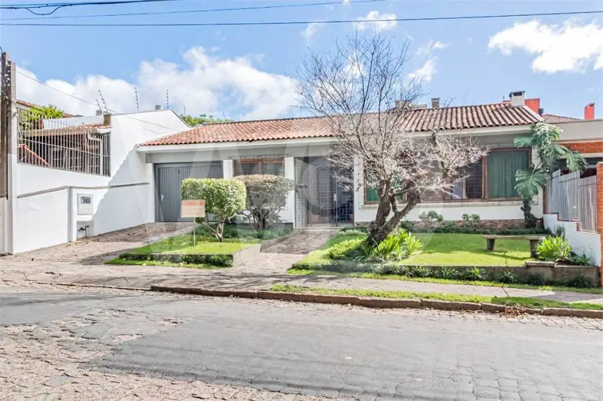 Foto 1 de Casa com 4 Quartos à venda, 250m² em Três Figueiras, Porto Alegre