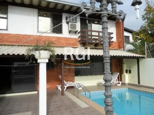 Foto 1 de Casa com 4 Quartos à venda, 318m² em Três Figueiras, Porto Alegre