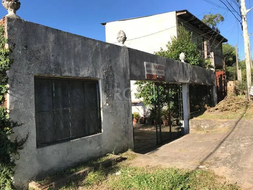 Foto 1 de Casa com 4 Quartos à venda, 100m² em Vila Nova, Porto Alegre