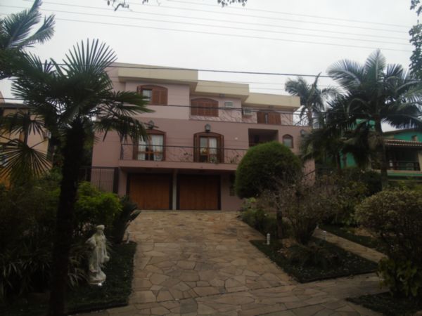 Foto 1 de Casa com 5 Quartos à venda, 517m² em Cavalhada, Porto Alegre